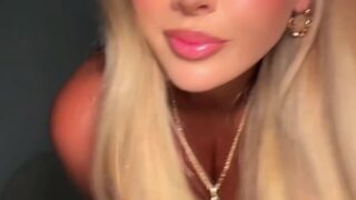 Busty Lily Lanes moans while cock slides between tits