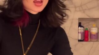 Thigh highs and collar on while Noemiexlili strokes cock in cam show