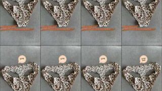 Lil Braids petite body wrapped in silk scarf on rooftop at sunset