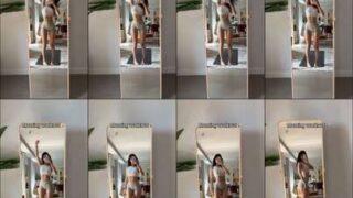 Pink crop top Yaelaris free sex tape strip in living room