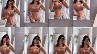 Balcony pose Yaelaris oil tits under city lights